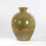 Paul Barron (British 1917-1983), a stoneware bottle vase in graduated celadon/ash glaze,