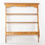 A set of pine hanging shelves with five drawers beneath, by Batheaston Furniture,