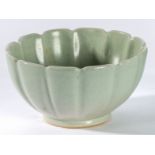 Charles Vyse (British 1882-1971), a celadon glaze lobed bowl, incised marks to base,