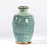 Mike Dodd (British, born 1943), a bottle vase in graduated pale blue glazes, seal mark,