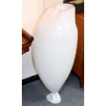 A white composition floor lamp,