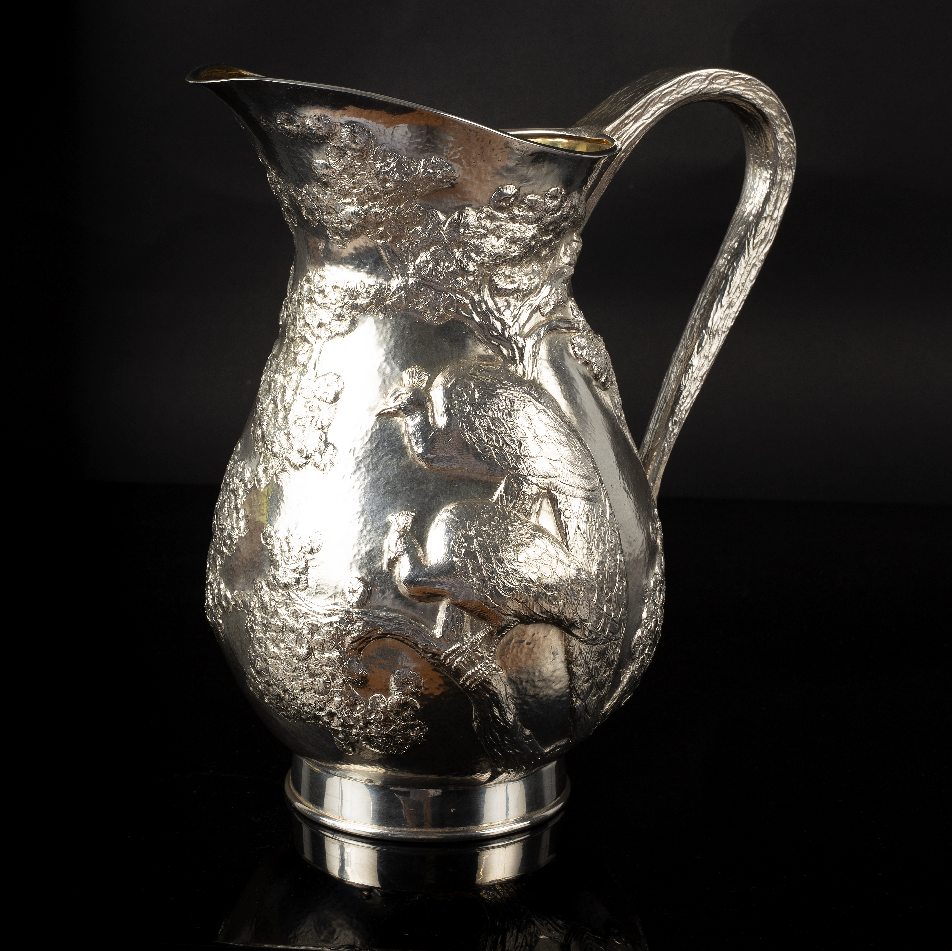 Stella Campion (British, Contemporary), a silver jug, London 1990,