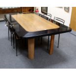 Bowman Brothers, an early 20th Century oak dining table, with Art Deco style curved legs,