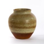 Ray Finch, Winchcombe Pottery, an earthenware vase with speckled graduating glaze of celadon,