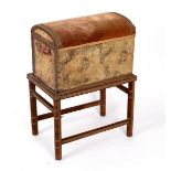 A velvet covered chest with domed cover and handles to sides,
