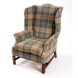 A George III style wing armchair