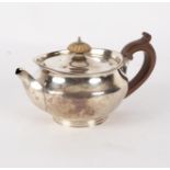 A George III circular silver teapot, Robert & Samuel Hennell, London 1804,