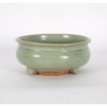 A celadon glaze censer, incised, on three feet, 16.