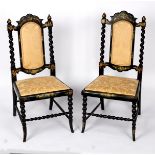 A pair of Victorian ebonised side chairs with painted and gilt decoration,