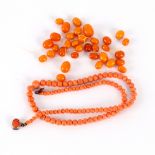 A coral bead necklace,