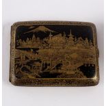 A Japanese niello decorated cigarette case, a small ivory carved box and cover,