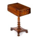 A 19th Century mahogany Pembroke work table fitted two drawers on turned column and platform base,