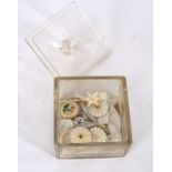A quantity of mother-of-pearl gaming tokens to include fish shaped examples,