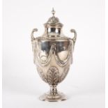 A George III silver sugar vase, William Abdy, London 1786, the acanthus chased lid with urn finial,