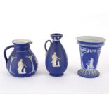 A Wedgwood blue jasper bough pot, jug and a ewer type jug, the largest 19.