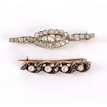 A diamond bar brooch, with central oval panel, 4.