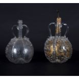 Two Dutch engraved glass decanters, 19th Century,