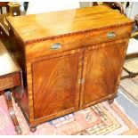 A George IV mahogany side cabinet, fitted a drawer above panel doors on turned feet, 90.