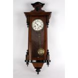 A Vienna type wall clock in a three-glass mahogany case,