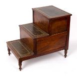 A George III set of mahogany bed steps with three treads on turned legs,