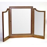 A mahogany and gilt metal mounted triptych mirror,