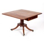 A Regency mahogany two-flap breakfast table with octagonal column and quadruple support,