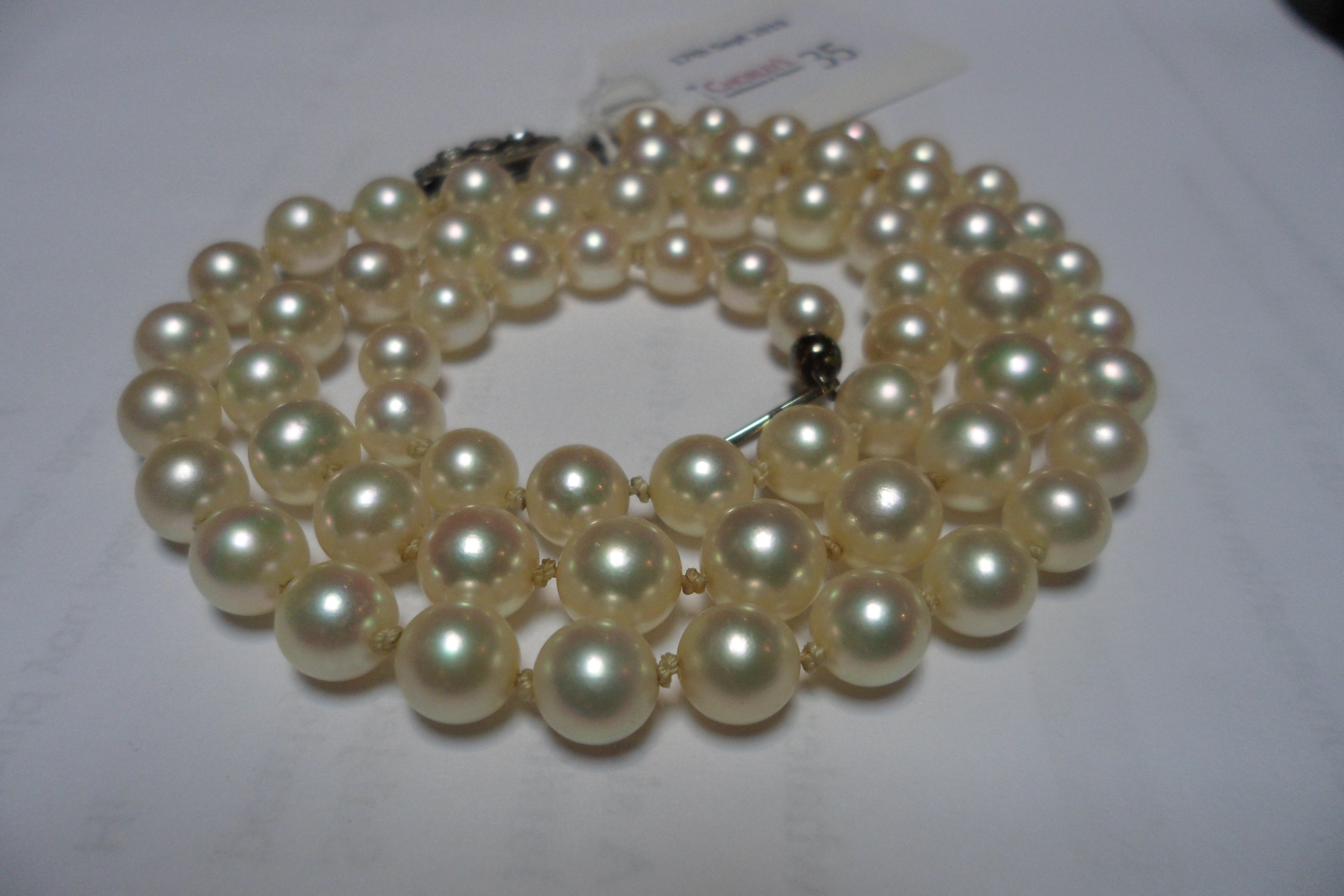 A single row of sixty-five graduated cultured pearls, 6mm to 9mm, - Image 2 of 7