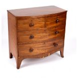 An early 19th Century mahogany bowfront chest of two long and two short drawers on splay feet