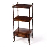 A Regency rosewood three tier whatnot on turned supports, the lower tier fitted a drawer,