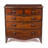 A Victorian mahogany bowfront chest fitted three long and two short drawers, on splay feet,