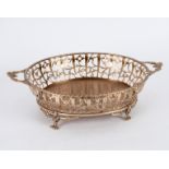 An oval silver basket, Birmingham 1929, with pierced sides, 28.