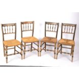 Four spindle back chairs with rush seats,