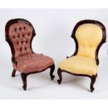 Two Victorian balloon back nursing chairs, both with carved frames,