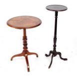 A burr walnut topped tripod table, 48cm diameter and a torchère on tripod base, 86.