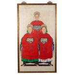 A Qing Chinese ancestor portrait of a gentleman, his wife and daughter,