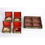 An early 19th Century pen and ink work tray fitted four boxes and covers containing bone counters,