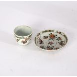 A Chinese famille verte tea bowl and saucer, Kangxi, with wavy rims,