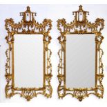 A pair of Chinese Chippendale style wall mirrors,