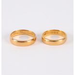 A 22ct gold wedding band, approximately 6.2gm and another approximately 4.