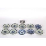 A pair of Chinese blue and white saucers, 18th Century, 16cm diameter, seven octagonal saucers,
