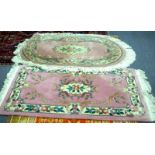 A Chinese pink ground rug,