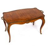 A French parquetry tray top table on gilt metal mounted legs,