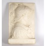 A plaster relief bust, of a helmeted youth, inscribed P Scipioni beneath, 61cm x 39.