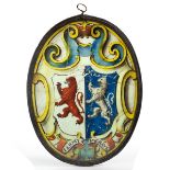 A 17th Century oval stained glass panel coat-of-arms, Jermy Pagrave, 24.
