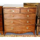An early 19th Century mahogany chest of three long and two short drawers on splay feet,