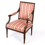 An upholstered open armchair,