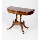 A Regency mahogany and brass inlaid tea table,