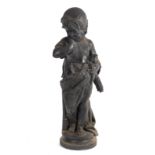 An ebonised plaster figure, Autumn,