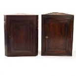 Two oak corner cupboards