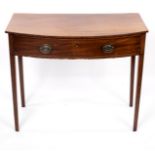 A Regency mahogany bowfront side table fitted a drawer,